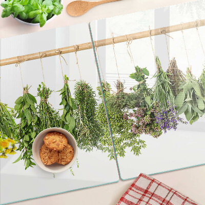 Szklana deska do krojenia z motywem suszonych ziół na sznurku