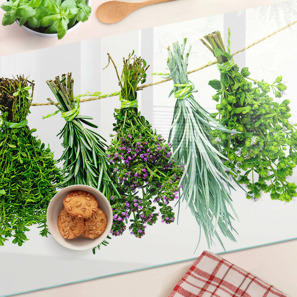 Szklana deska kuchenna z motywem suszonych ziół na sznurku