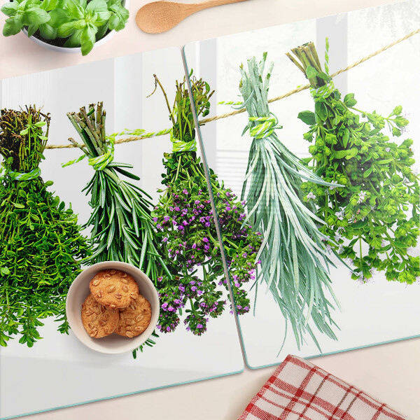 Szklana deska kuchenna z motywem suszonych ziół na sznurku