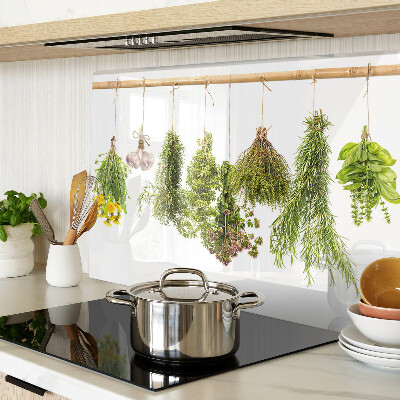 Szklana deska kuchenna z motywem ziół ułożonych w wiszące pęczki