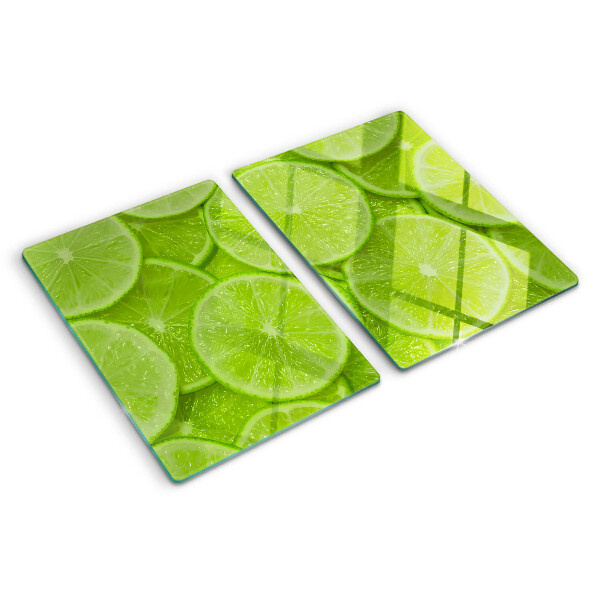 Szklana deska kuchenna z nadrukiem plastrów limonki na zielonym tle