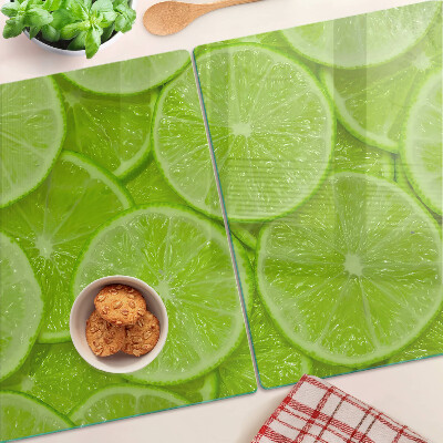 Szklana deska kuchenna z nadrukiem plastrów limonki na zielonym tle
