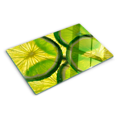 Szklana deska do krojenia z nadrukiem plasterków limonki na zielonym tle