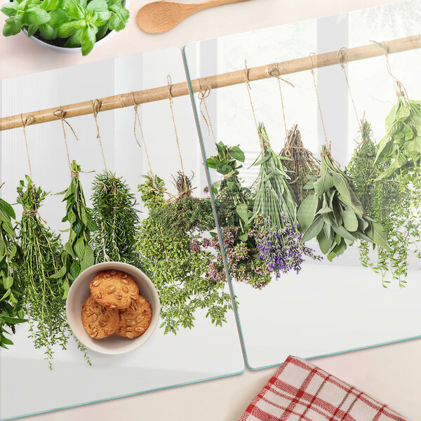 Szklana deska kuchenna z motywem suszonych ziół na sznurku