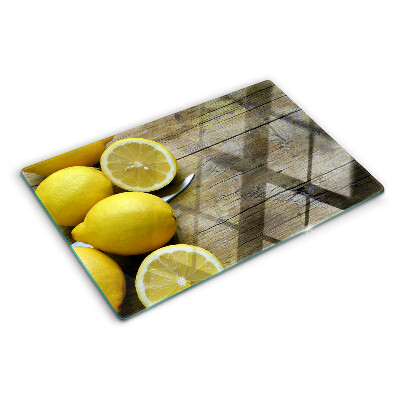 Deska kuchenna szklana z motywem cytryn na drewnianym tle