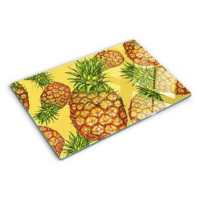 Szklana deska do krojenia z motywem ananasów na żółtym tle
