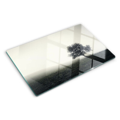 Szklana deska do krojenia z nadrukiem przedstawiającym drzewo w mglistym krajobrazie