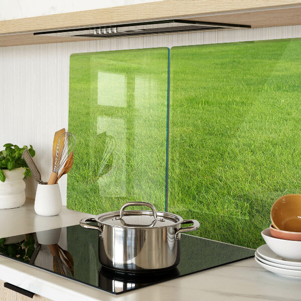 Szklana deska kuchenna z motywem zielonej trawy