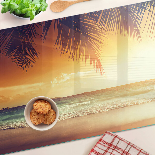 Deska kuchenna szklana z motywem zachodu słońca nad plażą