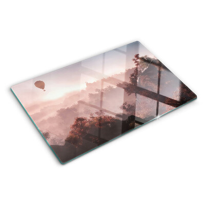 Szklana deska kuchenna z grafiką przedstawiającą balon na gorące powietrze nad krajobrazem