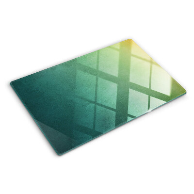 Deska kuchenna szklana z gradientowymi refleksami w oknie