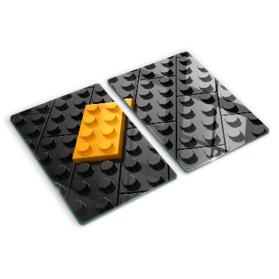 Szklana deska do krojenia z motywem klocków LEGO na czarnym tle