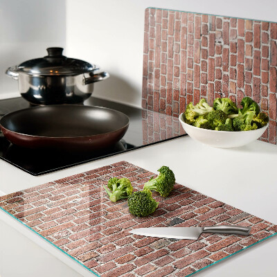 Szklana deska do krojenia z motywem ceglanej ściany