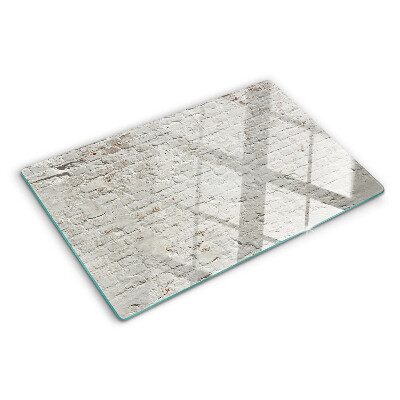 Szklana deska kuchenna z nadrukiem przedstawiającym ceglaną ścianę w stylu loftowym