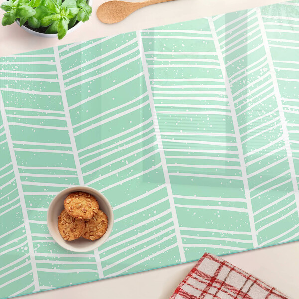 Szklana deska kuchenna w zielone paski z białymi liniami