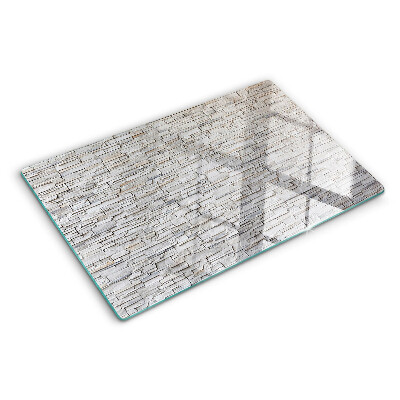 Deska kuchenna szklana z nadrukiem przedstawiającym kamienną ścianę z cegieł