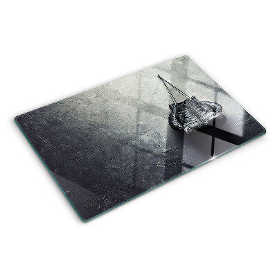 Szklana deska do krojenia z motywem fotela w minimalistycznym wnętrzu