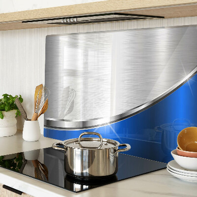 Szklana deska kuchenna z metalicznym wzorem i niebieskimi akcentami