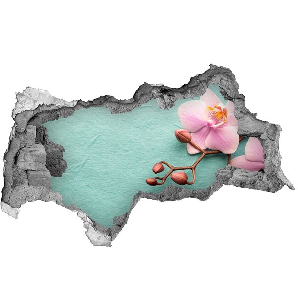 Samoprzylepna naklejka fototapeta Kwiat orchidei w uszkodzonej ścianie