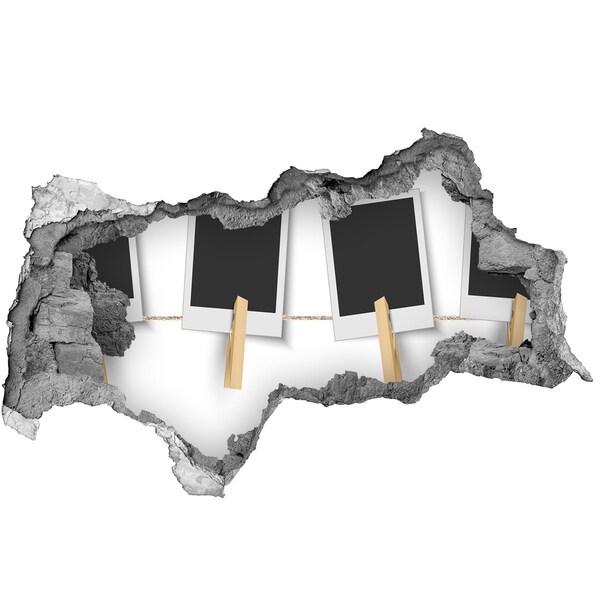 Foto zdjęcie dziura na ścianę Zniszczona ściana z ramkami na zdjęcia