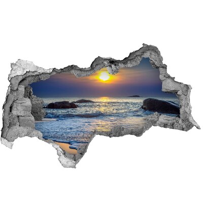 Dziura 3d w ścianie naklejka Zachód słońca morze