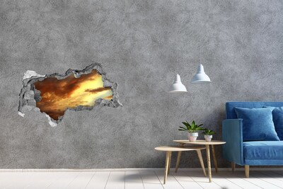 Fototapeta dziura na ścianę Zachód słońca przez dziurę w ścianie