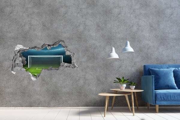 Fototapeta dziura na ścianę 3d naklejka Stadion piłkarski za dziurą w ścianie