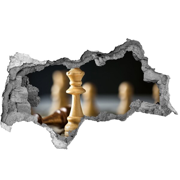 Foto zdjęcie dziura na ścianę Gra w szachy przez dziurę w ścianie