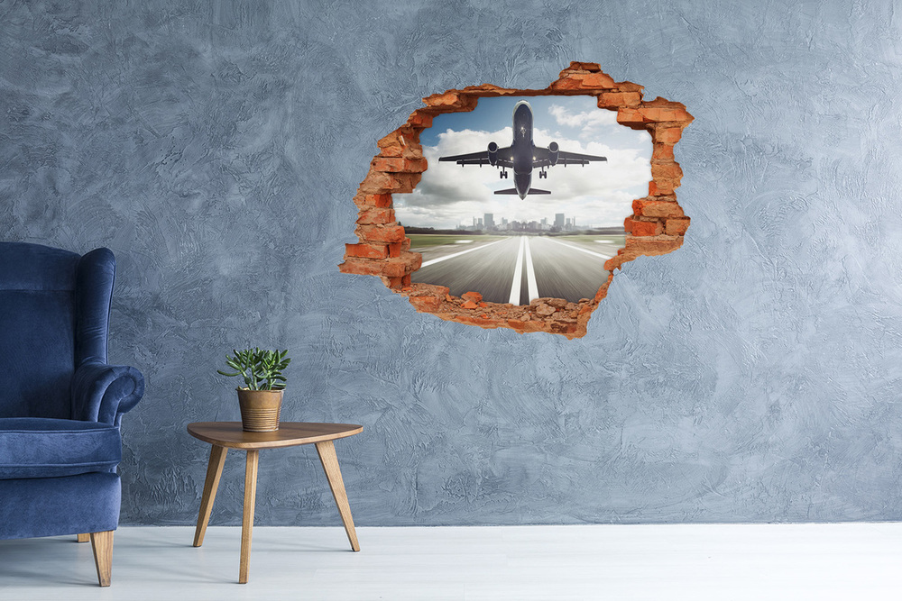 Foto zdjęcie dziura na ścianę Startujący samolot
