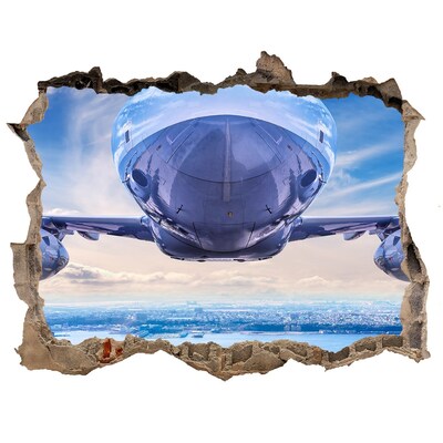Foto zdjęcie dziura na ścianę Samolot nad miastem