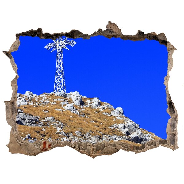 Dziura 3d w ścianie naklejka Górski krajobraz przez dziurę w ścianie