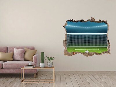 Fototapeta dziura na ścianę 3d naklejka Stadion piłkarski za dziurą w ścianie