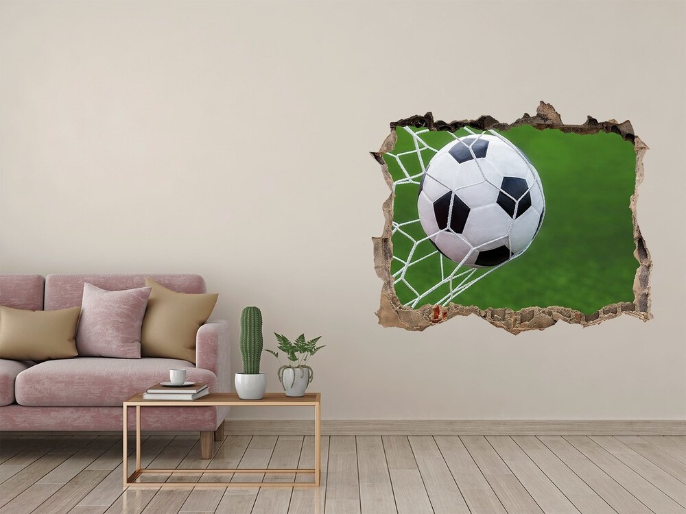 Foto zdjęcie dziura na ścianę Piłka w bramce