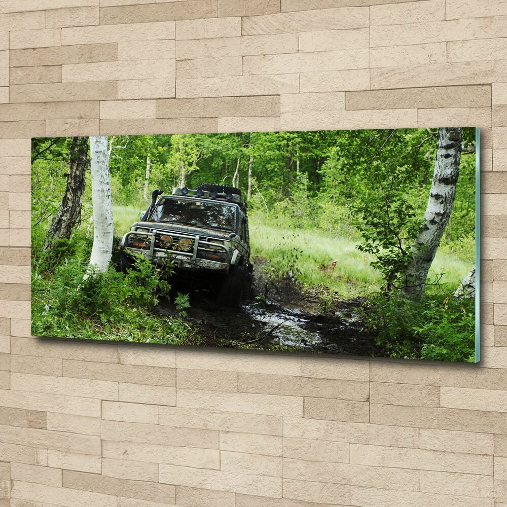 Foto obraz szkło akryl Jeep w lesie