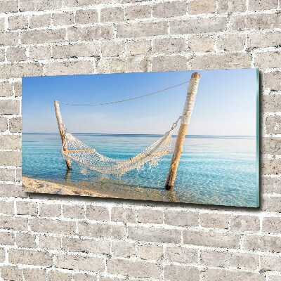 Foto obraz szkło akryl Hamak nad morzem