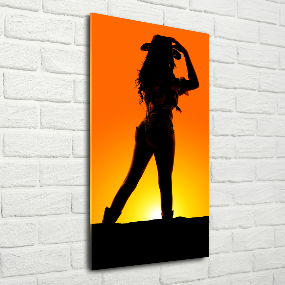 Foto obraz szkło akryl pionowy Sylwetka kowbojki