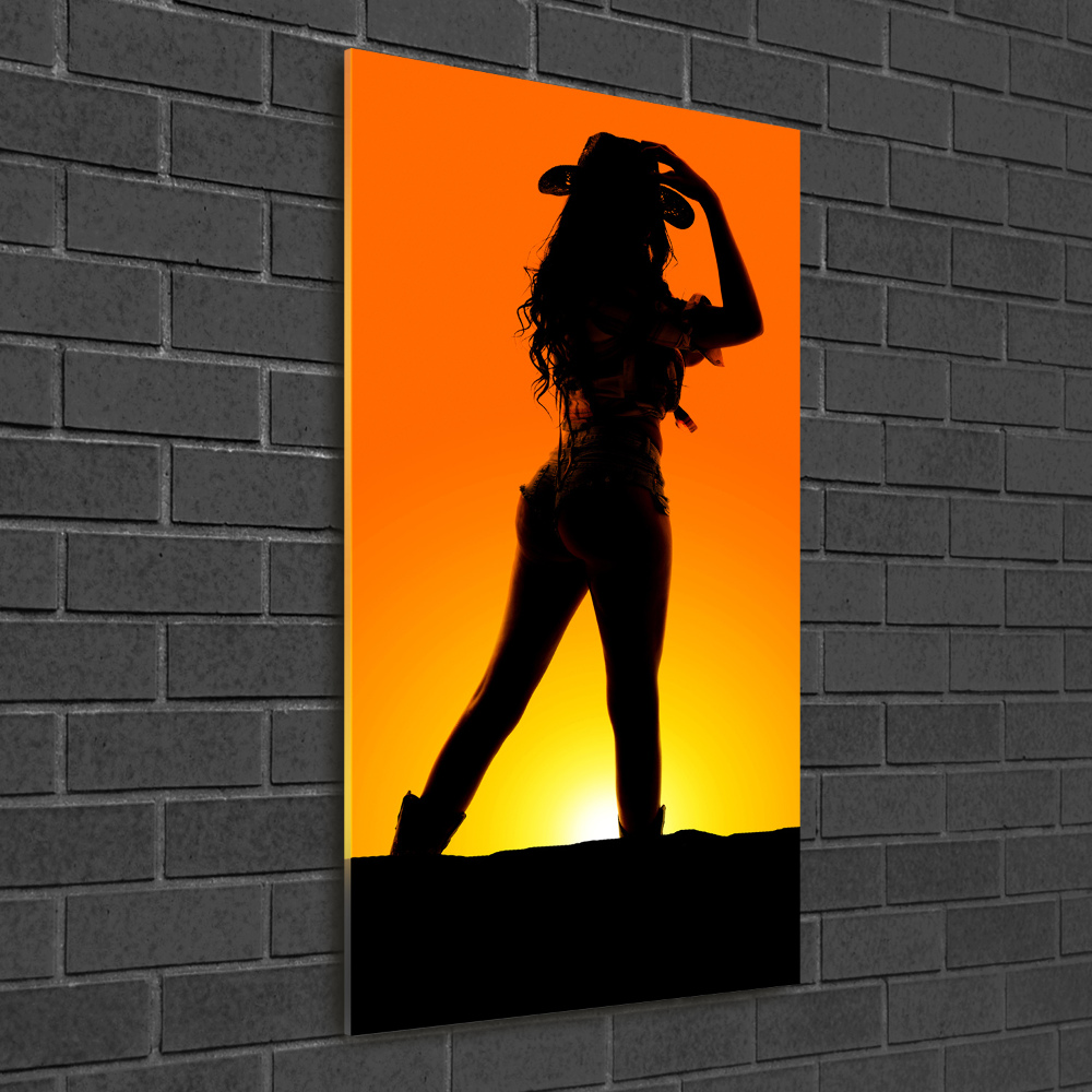 Foto obraz szkło akryl pionowy Sylwetka kowbojki