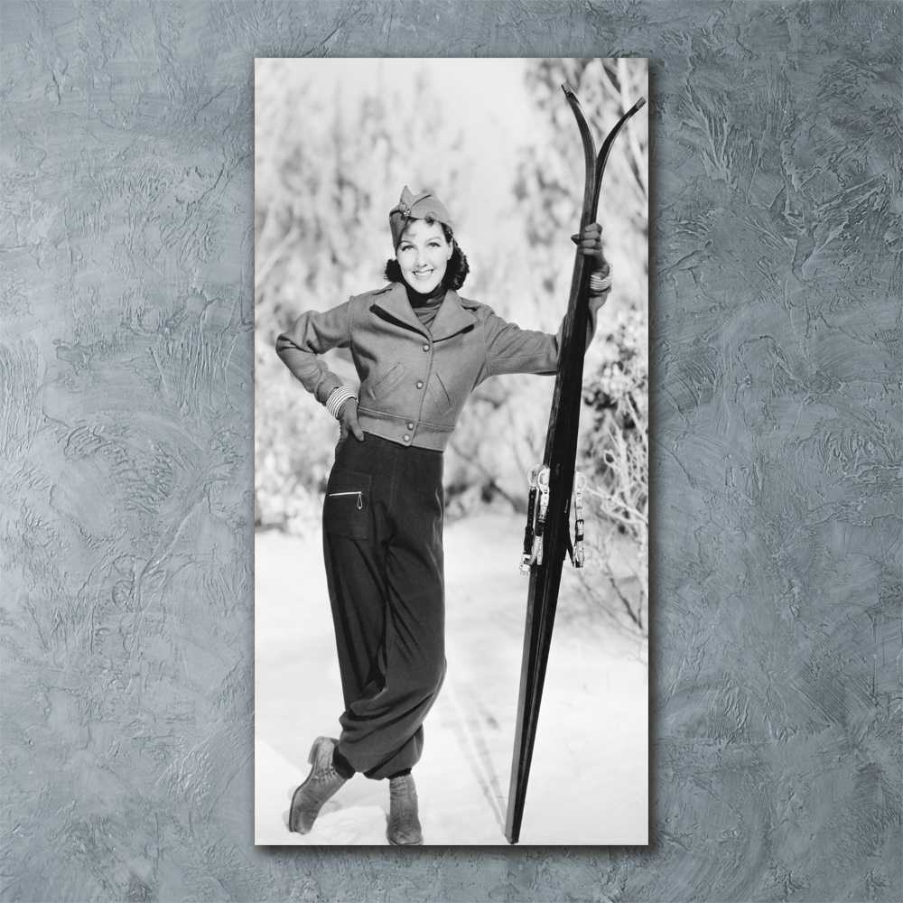 Foto obraz szkło akryl pionowy Kobieta z nartami