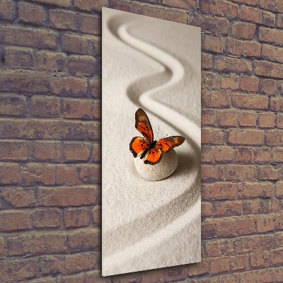 Foto obraz akryl pionowy Kamień zen i motyl