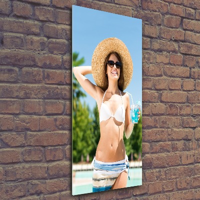 Foto obraz szkło akryl pionowy Kobieta nad basenem