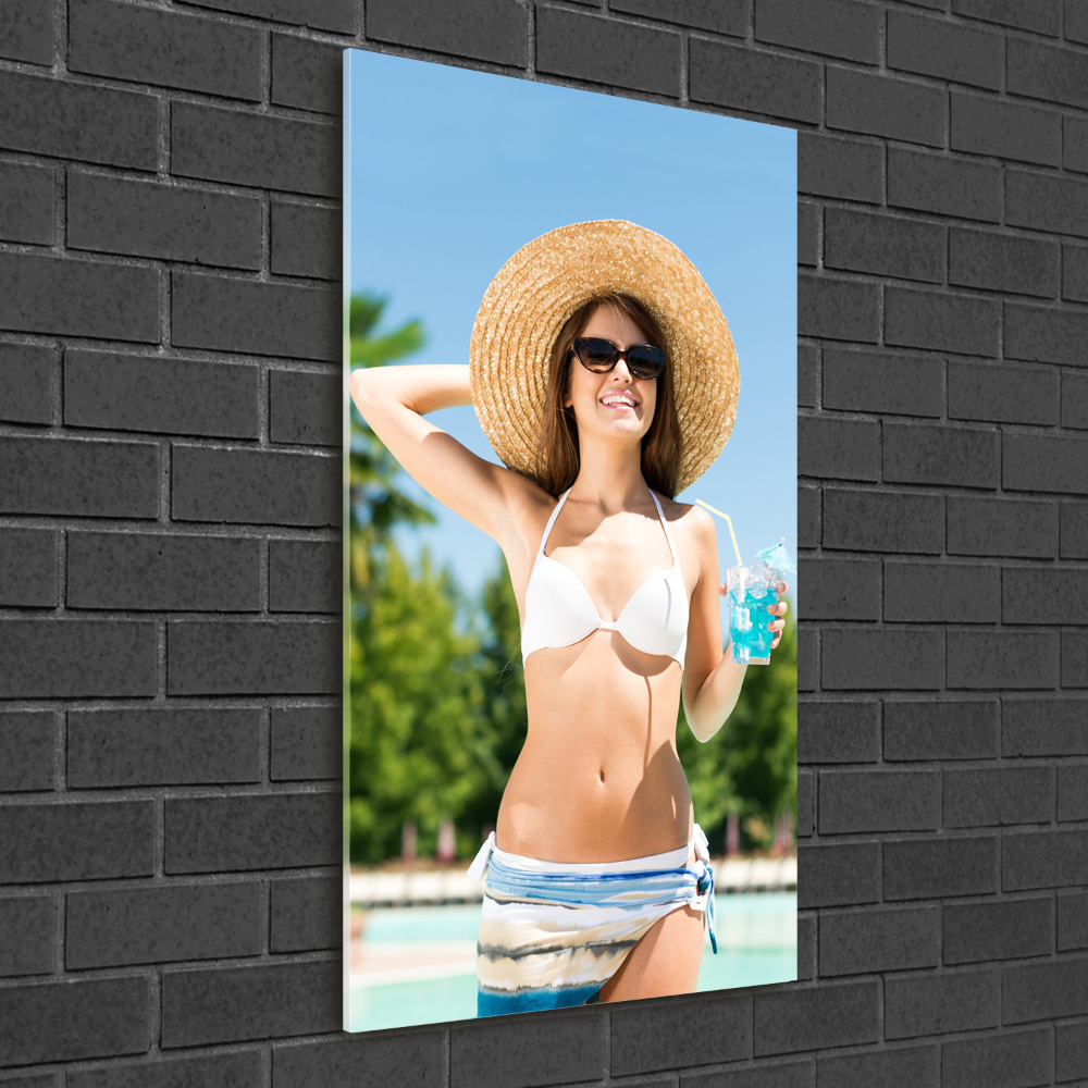 Foto obraz szkło akryl pionowy Kobieta nad basenem