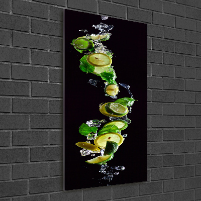 Foto obraz szkło akryl pionowy Limonki i cytryny