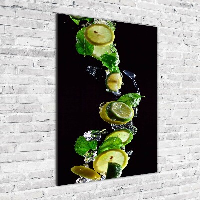 Foto obraz szkło akryl pionowy Limonki i cytryny