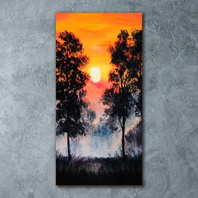 Foto obraz szkło akryl pionowy Zachód słońca las