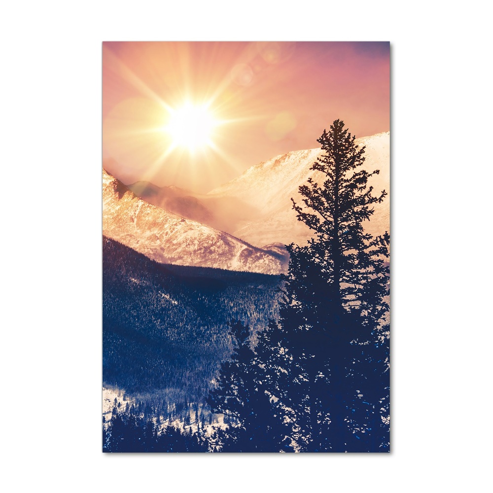 Foto obraz szkło akryl pionowy Słońce nad górami