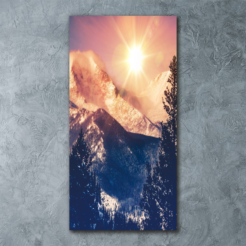 Foto obraz szkło akryl pionowy Słońce nad górami