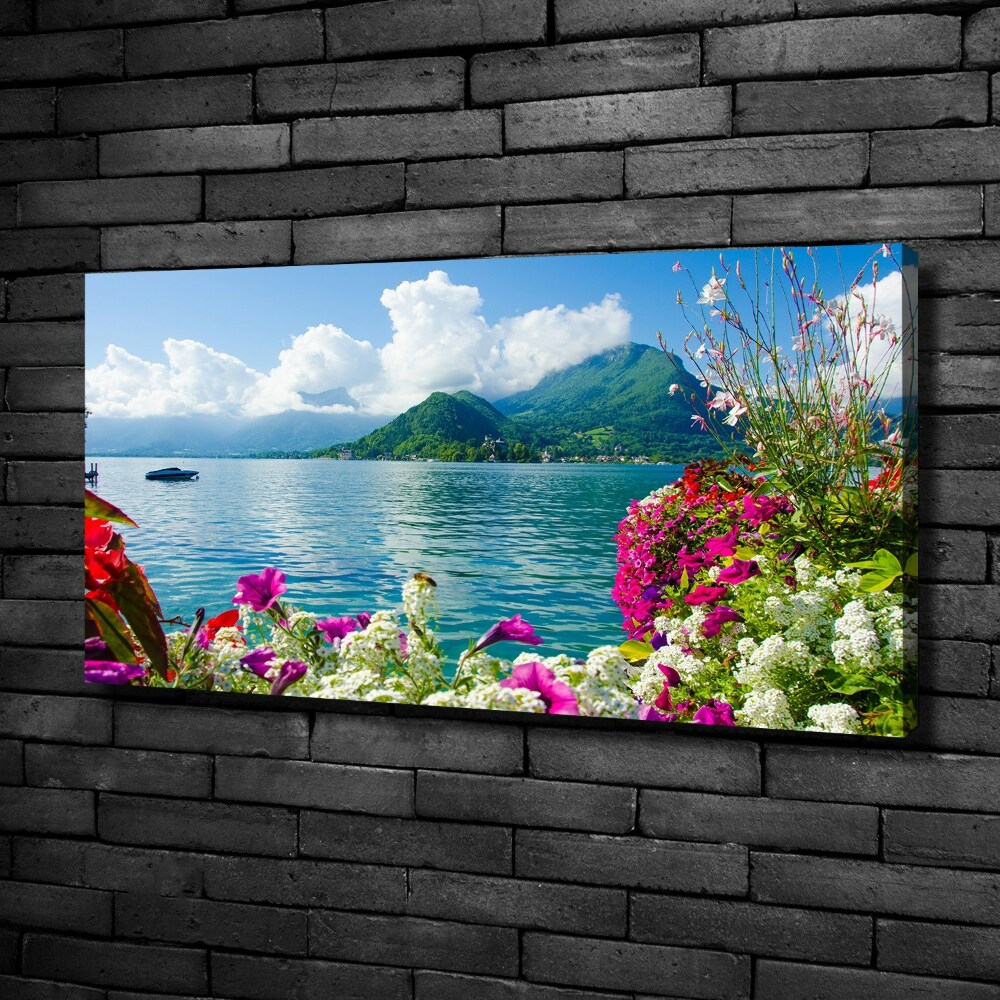 Foto obraz na płótnie Kwiaty nad jeziorem