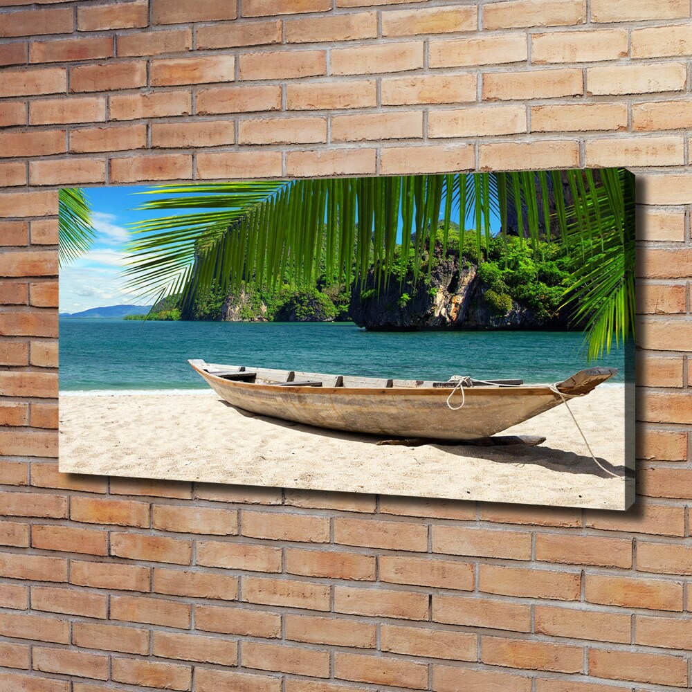 Foto obraz na płótnie Łódka na plaży