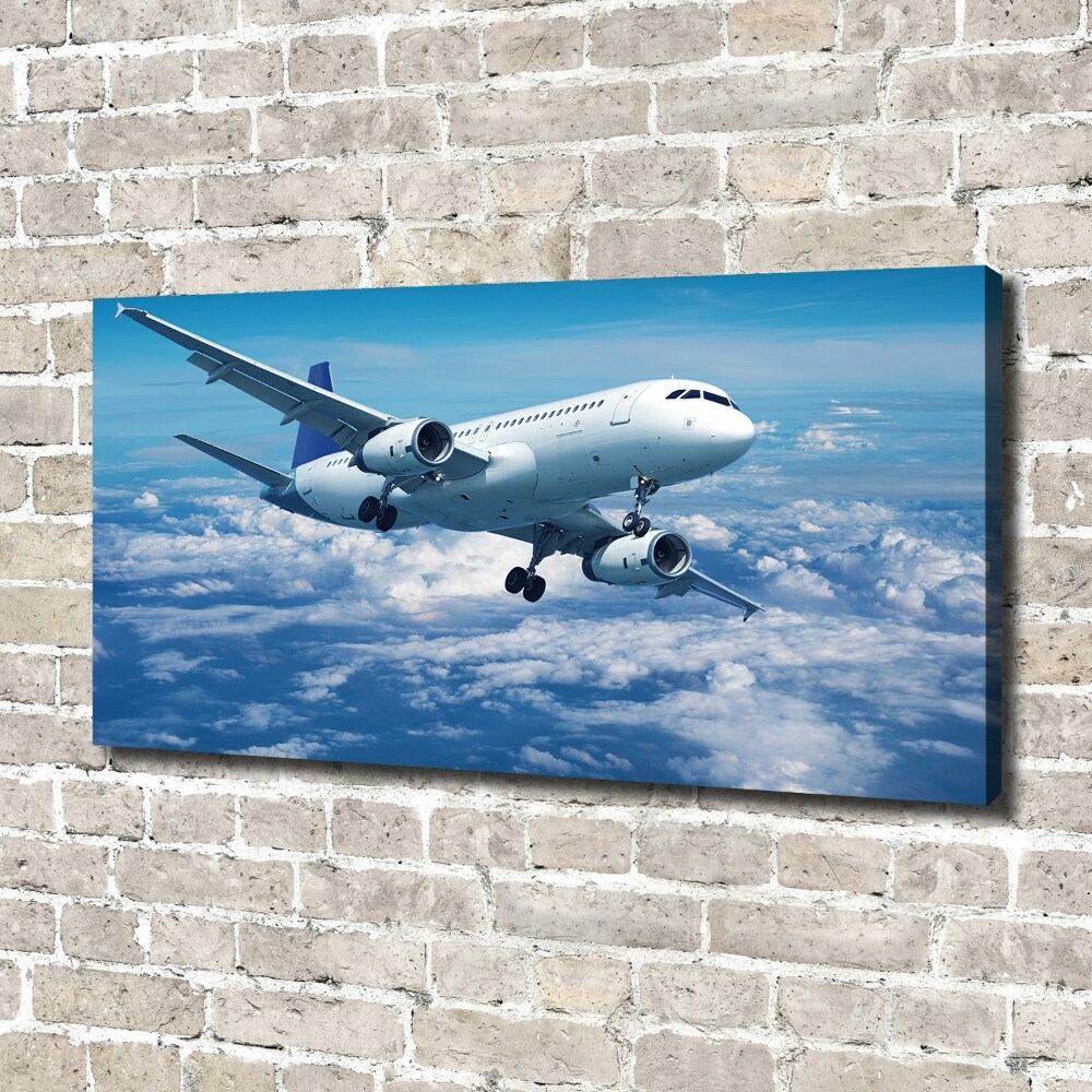 Foto obraz na płótnie Samolot w chmurach