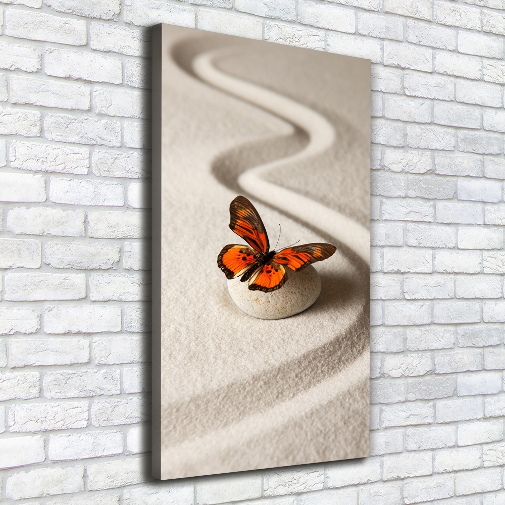 Foto obraz na płótnie pionowy Kamień zen i motyl